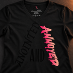 Anointed and Annoyed black V-neck tee detail with tonal black lettering and pink-to-peach print